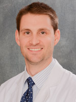 Mark E. Rogers, M.D.